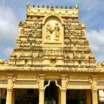 Exterior view of Annapurna Temple in Indore, highlighting its ornate architecture and intricate carvings.