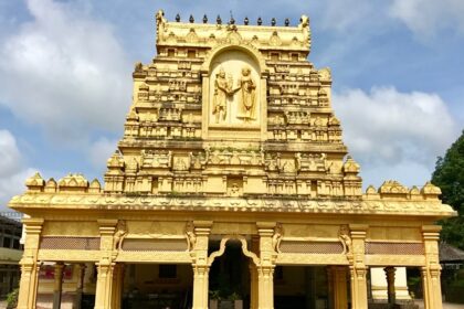 Exterior view of Annapurna Temple in Indore, highlighting its ornate architecture and intricate carvings.