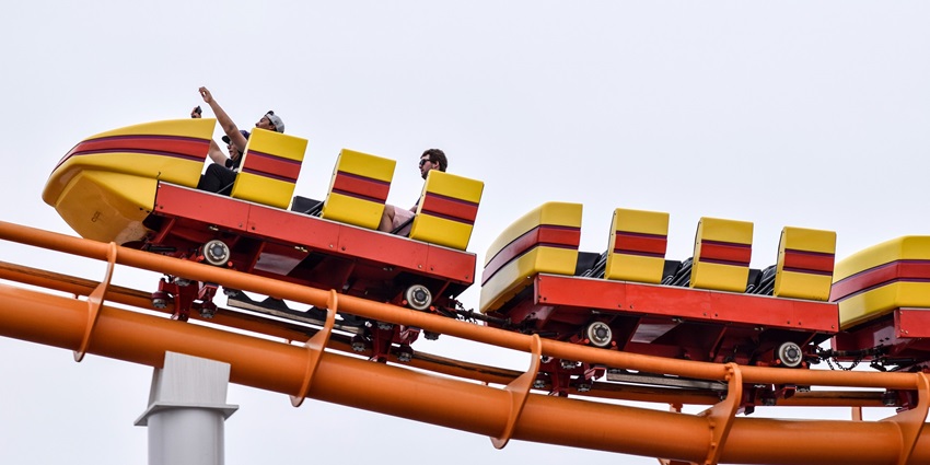 Guests having fun at Aquagreens Water Park in Kota and enjoying the roller coaster