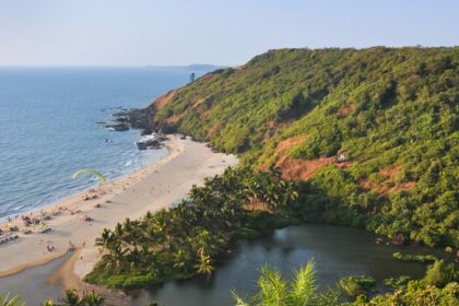 A view of the pristine Arambol Beach and serene Sweet Lake from a high point of view.