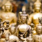 Image of small Buddha statues, a historic palace with an and elegant design Viewers of this file can see comments and suggestions