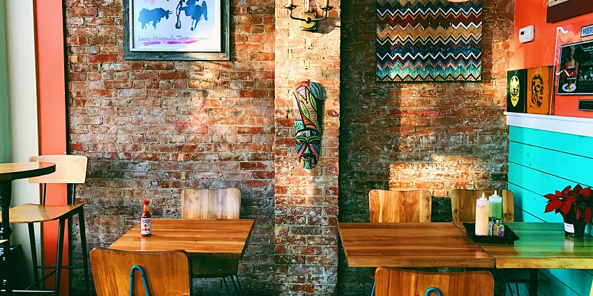 An inside view of the cafe of the region featuring colourful decor and rustic charm.