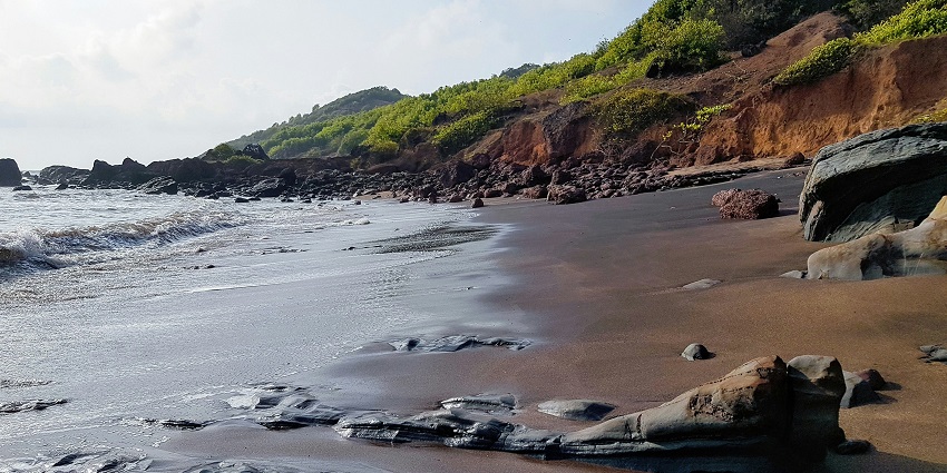 An image of Ashvem Beach which is one of the offbeat beaches in North Goa, India.