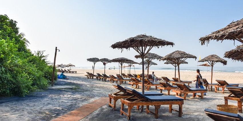 A picture of a beach resort in Goa with a vast coastline in the background