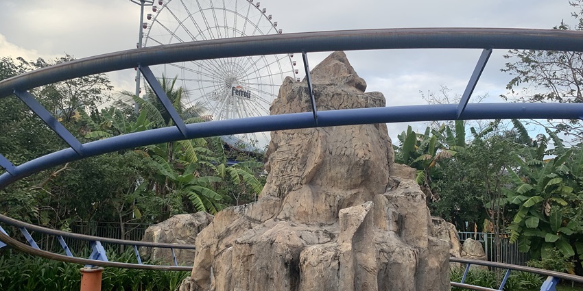 Colorful rides and cultural architecture at Asia Park, a theme park in Da Nang, Vietnam.