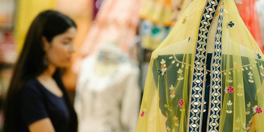 Asopalav Showroom offers a wide variety of bridal sarees and lehengas for brides.