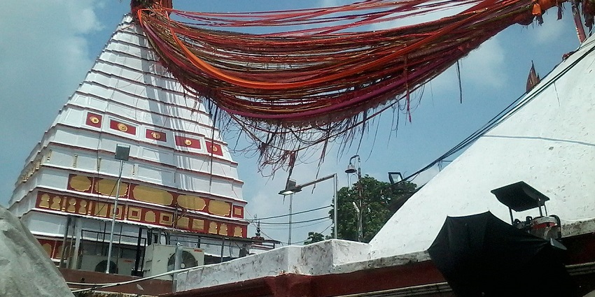 Red and white-coloured Baba Basukinath Dham, one of the temples near Bhuvaneshwari Temple.
Viewers of this file can see comments and suggestions