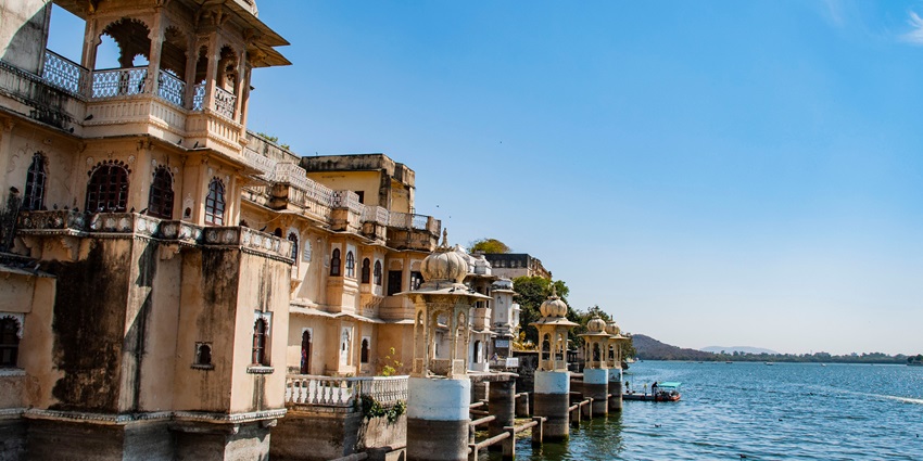 Gangaur Ghat with Bagore Ki Haveli in background, featuring its traditional architecture.