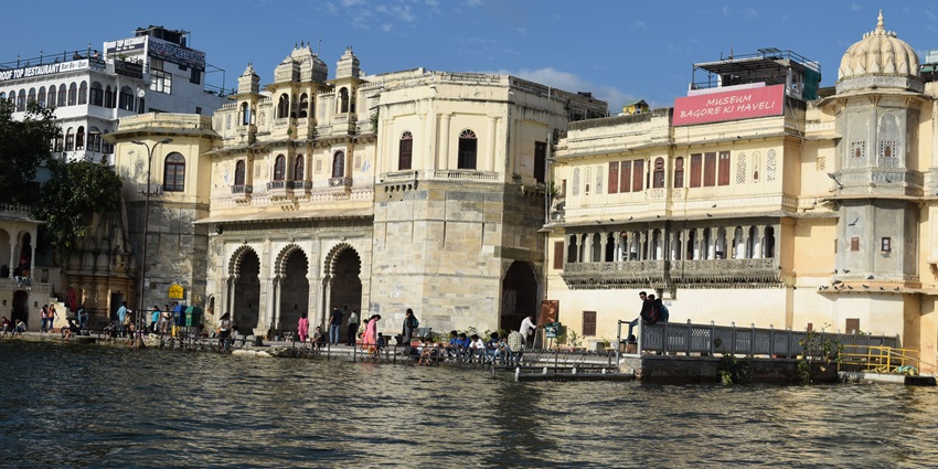 Backside view of Bagore Ki Haveli in Udaipur, showcasing its ornate architecture.