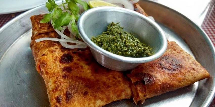 Snapshot of the mouthwatering Baida Roti which is being served on the plate in Restaurant