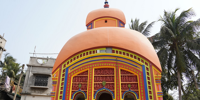 Alt Text: Baneshwar Temple is known to offer a peaceful setting amidst a waterfall and greenery.