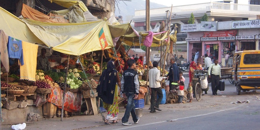 Bustling Jaipur market with people shopping, the best places to visit in Jaipur for shopping.