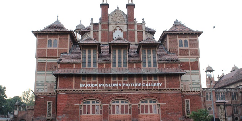 Exterior view of Baroda Museum and Picture Gallery, showcasing its grand architecture.
