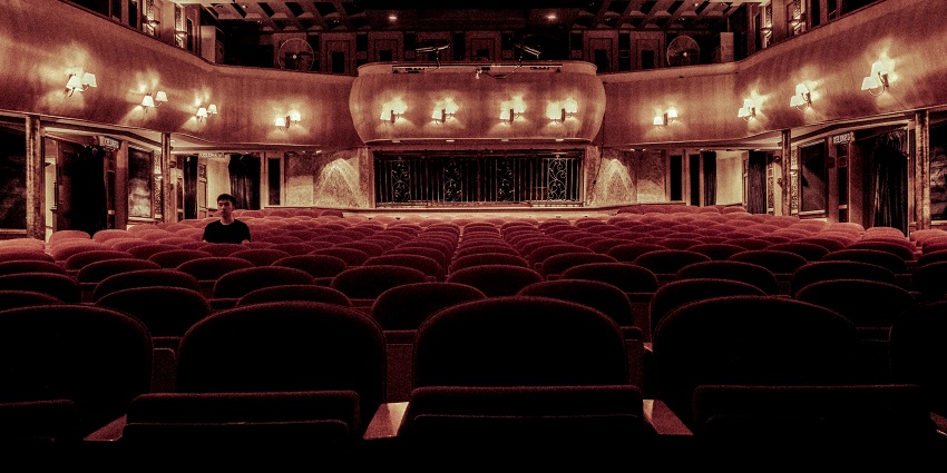 An inside view of Batra Theatre Backside Road in Punjab featuring an empty hall.