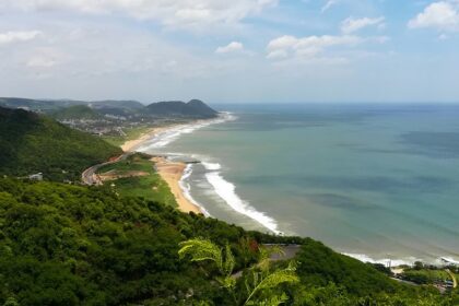 A view of the shimmering waters meeting the pristine golden sands in Andhra Pradesh.