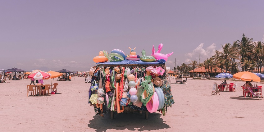 A beach shop filled with colourful inflatable toys and swimming accessories for summer fun.