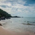 Exquisite view of beaches in Gokarna, with gleaming sands, rocky shorelines, and blue waters.