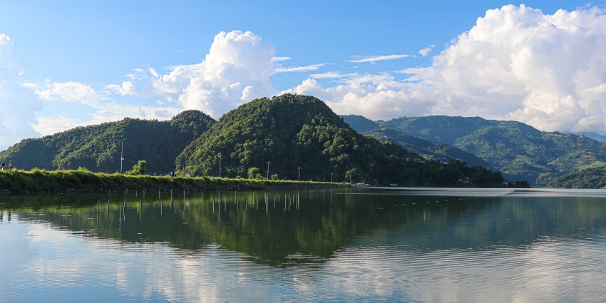 Tranquil Begnas Lake decked with forests is the perfect place for paragliding in Pokhara.