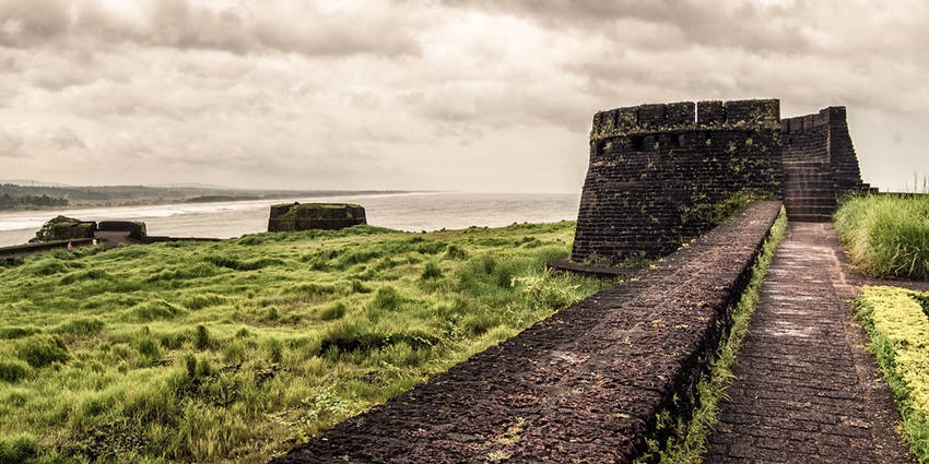 A quaint view of the rustic tourist attraction of the region surrounded by lush greenery.