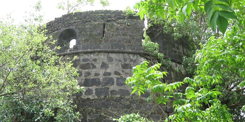 Places to visit in Belapur feature Fort offering lush greenery and stunning sunset views.