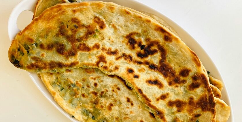 An image of crispy Amritsari Kulcha with chole served at a popular eatery in Ludhiana.