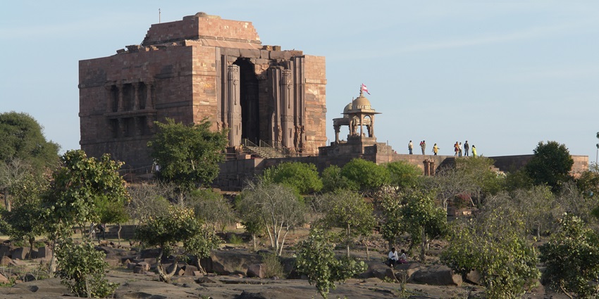 Dynamic entrance of Bhojpur Temple, teeming with devoted visitors and spiritual fervour.