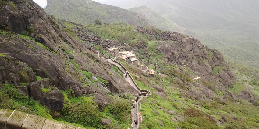 Lush greenery at Girnar Hill in Junagadh, Gujarat, India, showcasing dense vegetation.