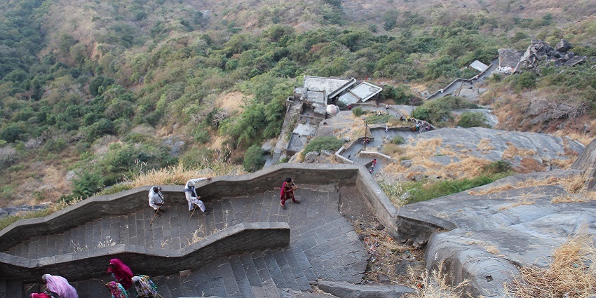 Pilgrims climbing the mountain range near Girnar National Park and the historic jain temple