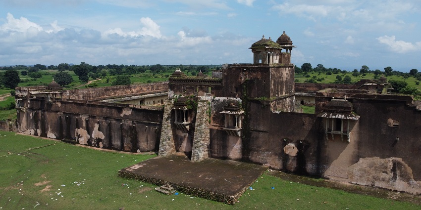 A picturesque view of the Rohtasgarh Fort in Bihar with a cloudy and pleasant blue sky.