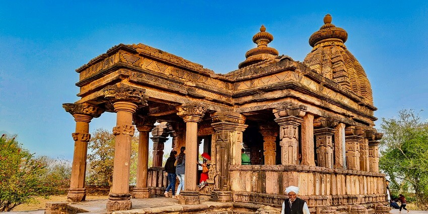 View of the temple building, the intricate architecture and carvings on the pillars