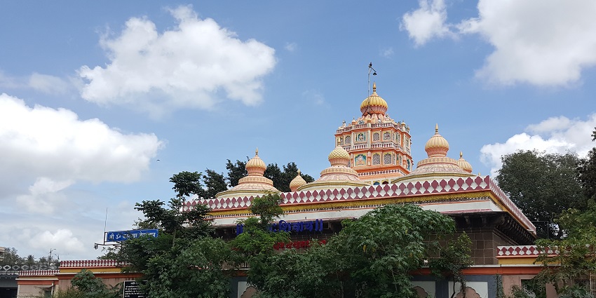 Panoramic view of Omkareshwar Temple complex, showcasing its architectural layout and surrounding landscape.