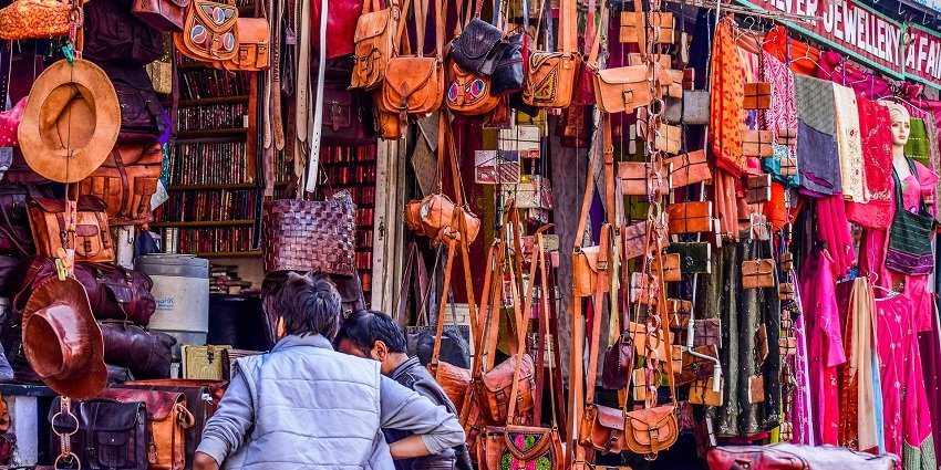 A vibrant market selling the traditional Rajasthani leather goods and various products.