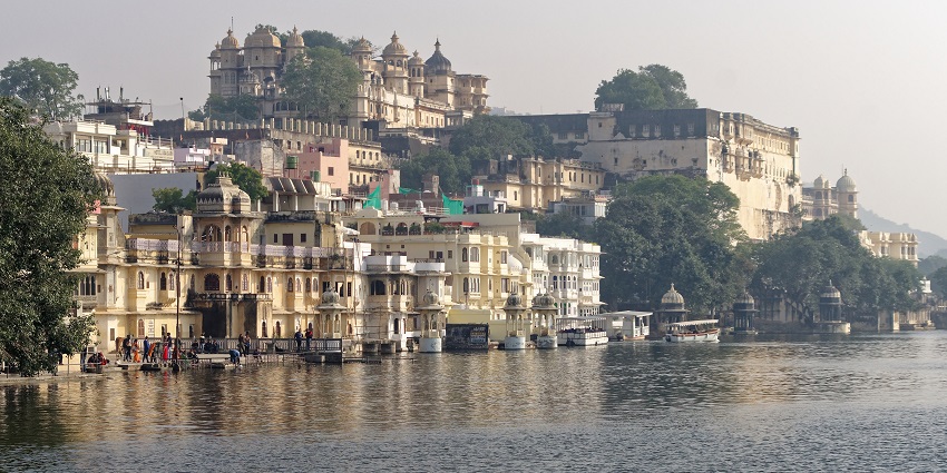 Panoramic view of the idyllic Udaipur city and its majestic Palace from across the lake