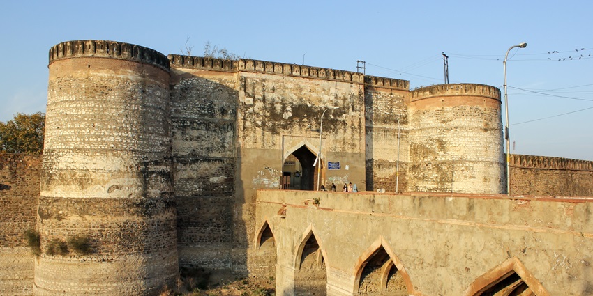 The ancient Lohagarh fort with the bridge across the river moat in the town of Bharatpur.