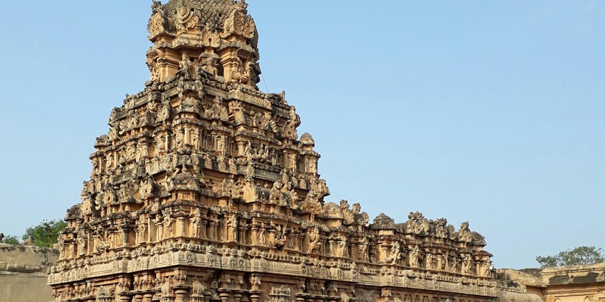 Beautifully adorned the temple facade, a testament to divine artistry and tradition.