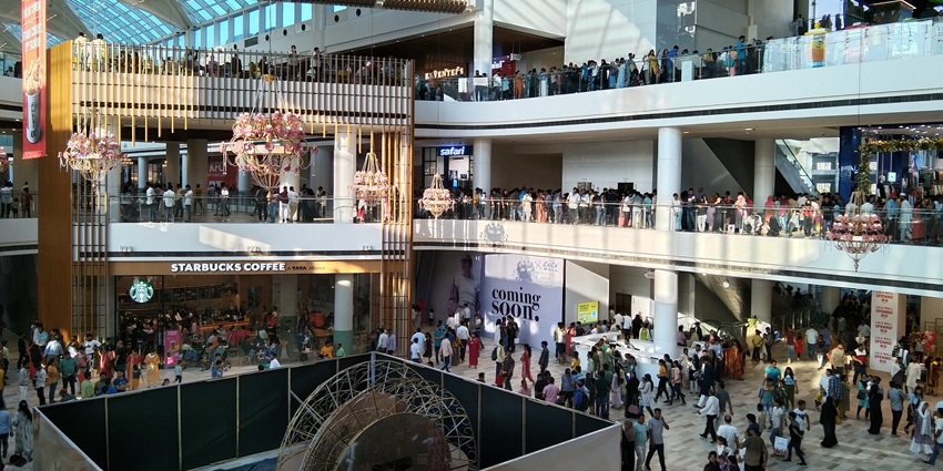 Exterior view of Bestech Mall showing beautiful glass work and flush of visitors.