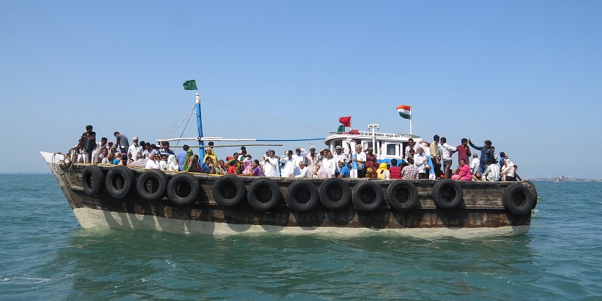 A big group of visitors sailing towards Bet Dwarka on a designated ferry.