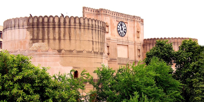 The red walls of Bhadra Fort, showcasing its historic architecture and rich heritage.