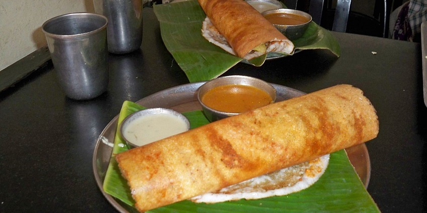 Masala dosa served with coconut chutney and spicy sambhar, a south Indian delicacy