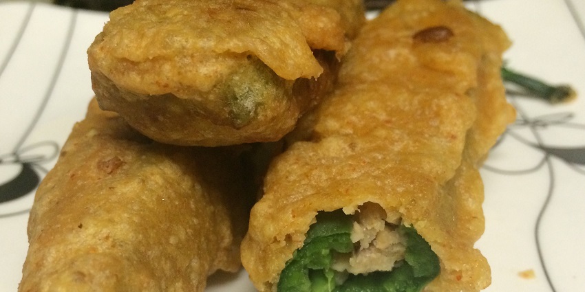 Stuffed Mirchi Bhajiya, a popular Indian snack, is the famous street food in Anand, Gujarat.