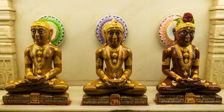 Beautiful idols of Jain Gods with intricate designs at the Bhandasar Jain Temple.