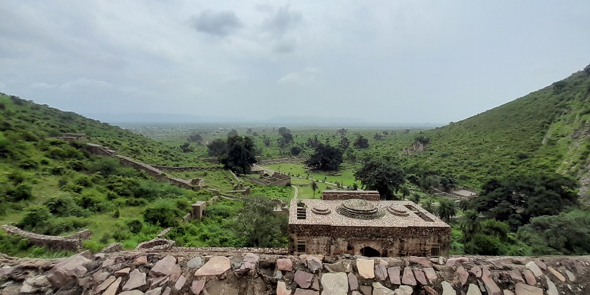 A scenic view from the top of Bhangarh Fort, a famously haunted place to see near Neemrana.