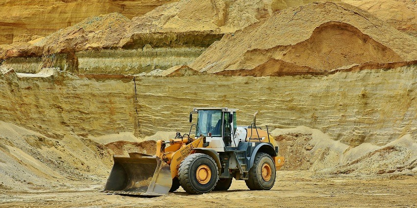 A yellow front loader at the Bharveli Manganese Mines of Madhya Pradesh