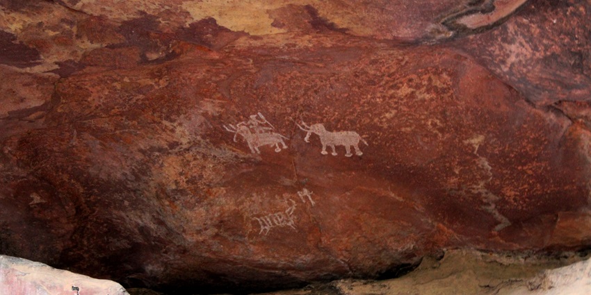 Ancient Rock Shelter at Bhimbetka, a fascinating tourist attraction near Kakanmath Temple.