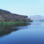 An image of tranquil Siliserh Lake offering stunning views and a serene atmosphere.