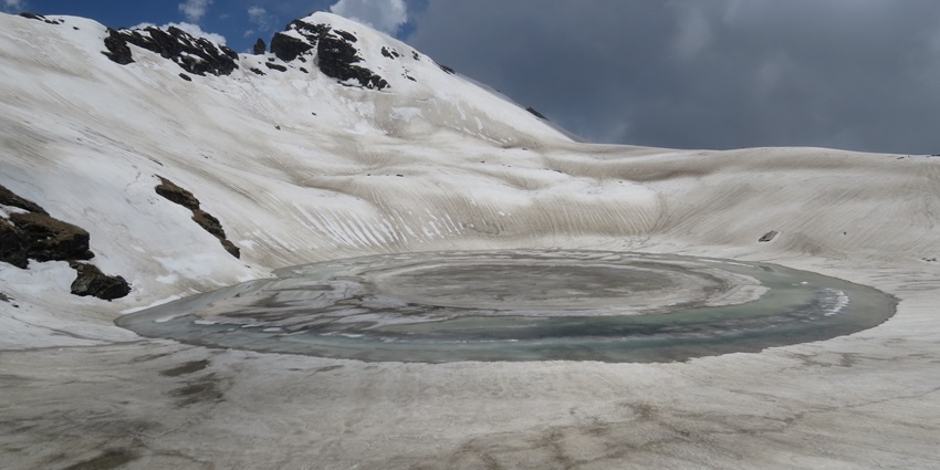 Trekking to Bhrigu Lake begins in the beautiful meadows of Gulaba and ascends through alpine woods.