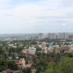 Panoramic image of the Bhubaneswar skyline which is surrounded by lush forest