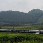 A picture of a beautiful valley in Andhra Pradesh with a railway line passing through the middle