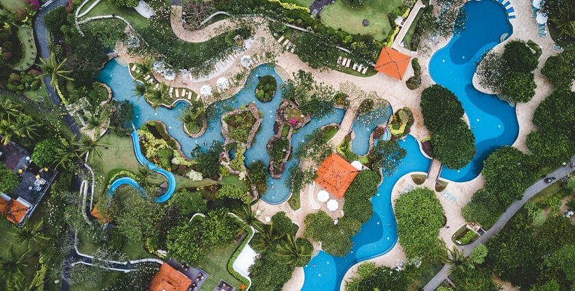 An aerial view of the famous leisure hub in Ajmer surrounded by lush green vegetation.