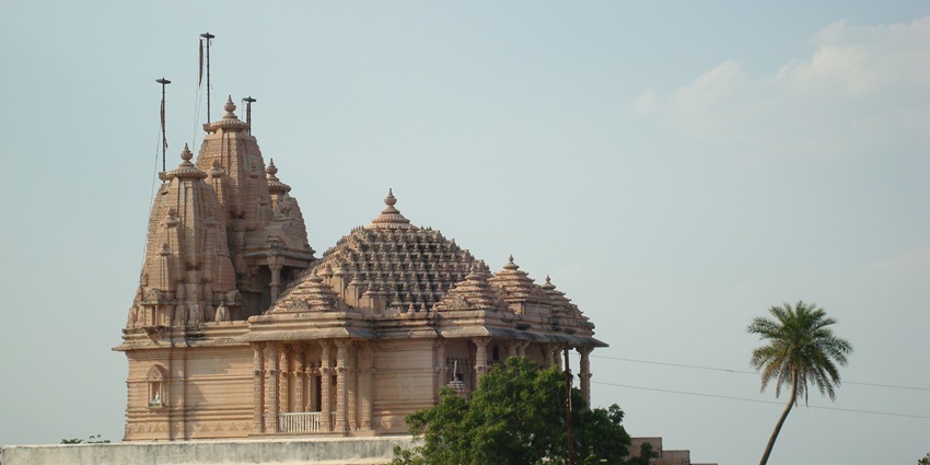 White marble Laxmi Narayana (Birla) Temple in Bhopal under clear sky.